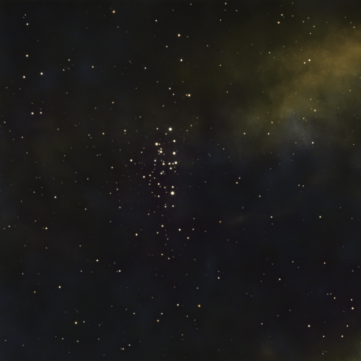 A starry night sky filled with numerous stars of varying brightness against a dark background, featuring a specific cluster of bright stars prominently.